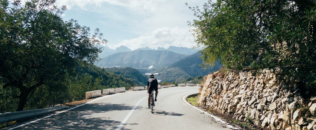 Image of Silhouette of the cyclist riding a road bike at sunset. mountain bicycle and man. life style outdoor