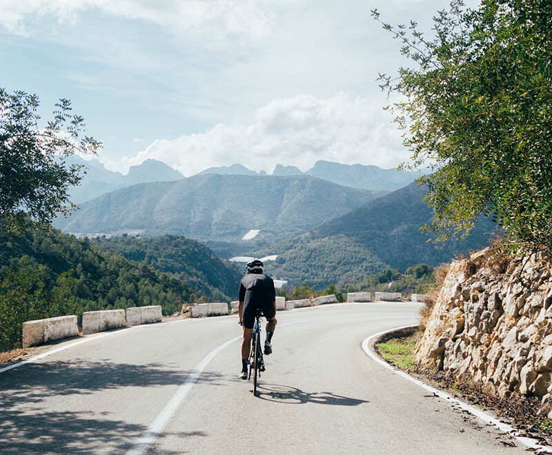 Image of Silhouette of the cyclist riding a road bike at sunset. mountain bicycle and man. life style outdoor